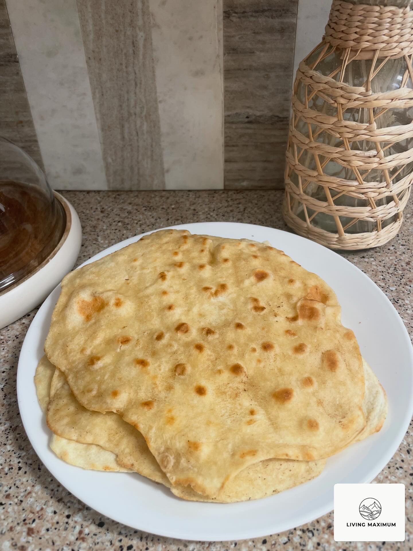 Homemade tortillas on a white plate